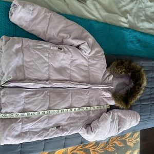 The North Face girls winter jacket fits 14/16yrs. Soft lavender corduroy shell.